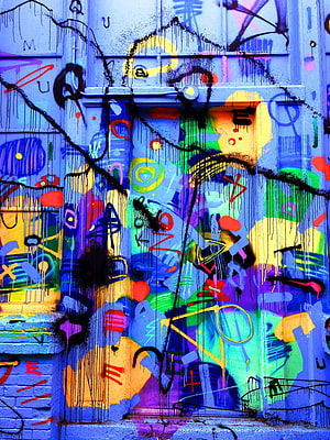 Vibrant Multicolored Graffiti Art Covering a Weathered Urban Door HD phone wallpaper