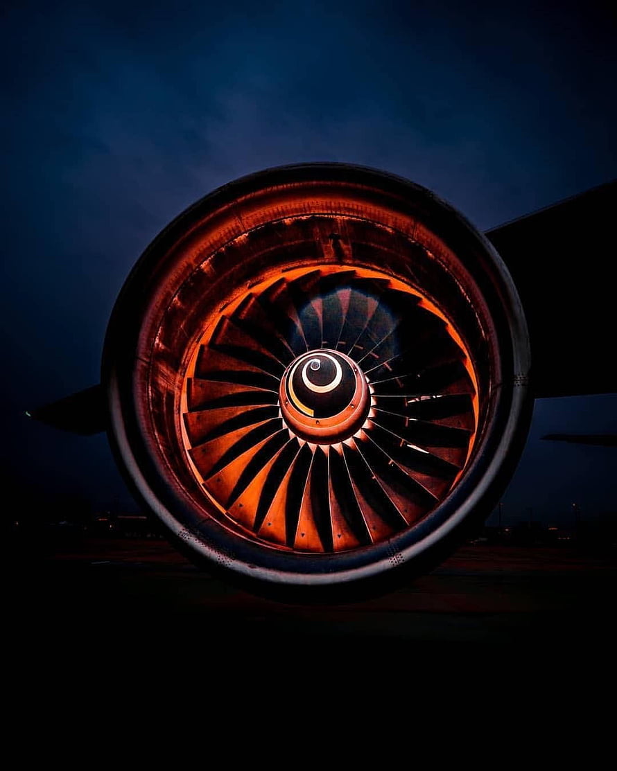Rolls-Royce RB211 Turbofan Engine Close-Up with Dramatic Orange Lighting at Night HD phone wallpaper