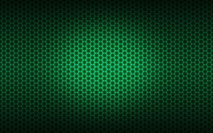 Dark Green Hexagonal Grid Pattern with Glowing Center for Gaming Backgrounds HD wallpaper