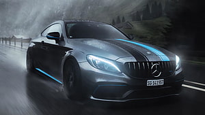 Mercedes-AMG C63 S Coupe with Blue Racing Stripes Driving on a Rainy Mountain Road HD wallpaper