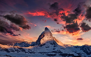 Matterhorn Peak at Sunset with Dramatic Red Clouds and Snowy Alpine Landscape HD wallpaper