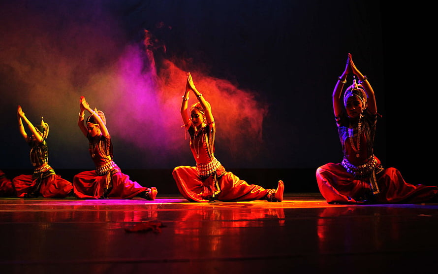 Indian Classical Dance Performance with Dramatic Stage Lighting and Smoke Effects HD wallpaper