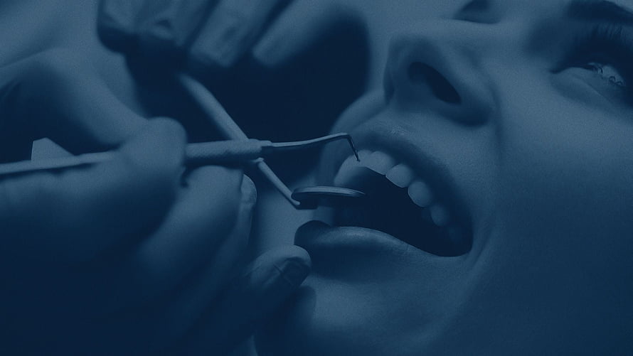 Close-up of a dental examination with professional instruments and patient mouth HD wallpaper