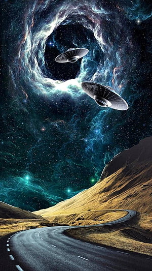 UFOs hovering above a winding desert road beneath a swirling cosmic nebula and starry sky HD phone wallpaper