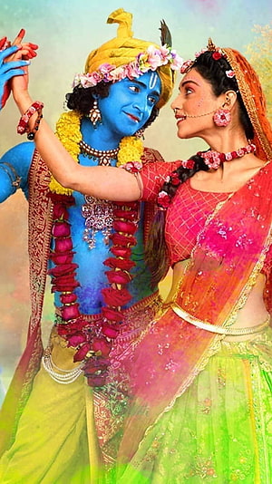 Radha Krishna in Traditional Indian Attire with Floral Garlands and Jewelry HD phone wallpaper