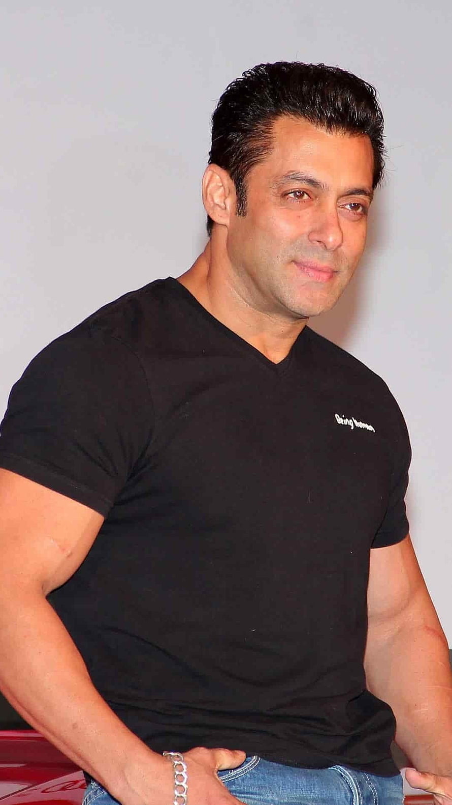 Salman Khan in Black V-Neck T-Shirt and Jeans HD phone wallpaper