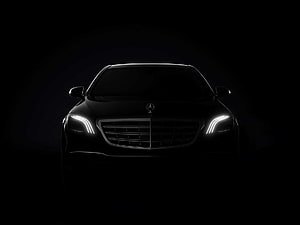 Mercedes-Benz S-Class Front Facade with Illuminated LED Headlights in Dark Setting HD wallpaper
