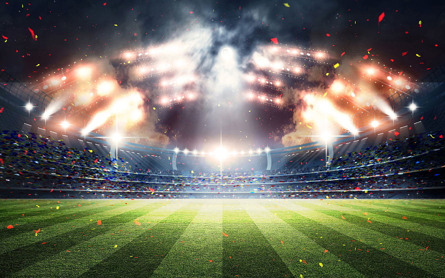Vibrant Soccer Stadium Interior With Confetti And Bright Floodlights HD wallpaper