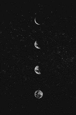 Minimalist Black and White Moon Phases Against a Starry Night Sky HD phone wallpaper