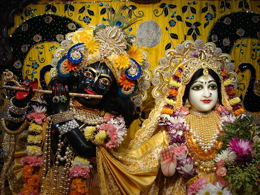 Banke Bihari and Radha Murti Adorned in Gold Jewelry and Fresh Flower Garlands HD wallpaper