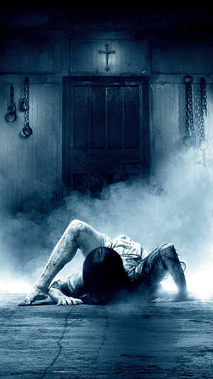 Eerie Ghost Girl Crawling in Foggy Asylum Room with Chains and Cross HD phone wallpaper