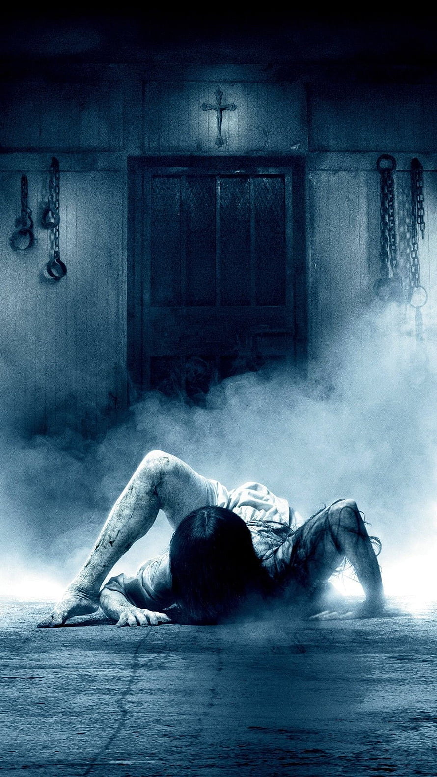 Eerie Ghost Girl Crawling in Foggy Asylum Room with Chains and Cross HD phone wallpaper