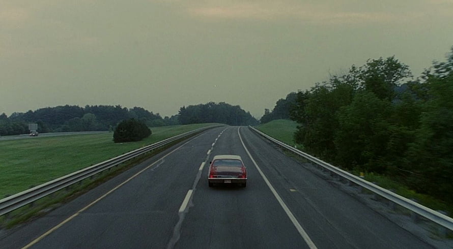 Good Will Hunting Movie Scene: Red Car Driving on a Rural Highway at Dusk HD wallpaper