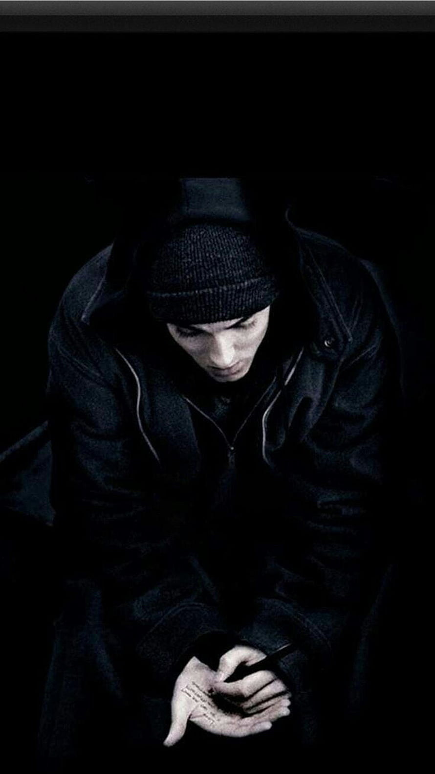 Eminem in Dark Hooded Coat and Beanie with Tattooed Hand HD phone wallpaper