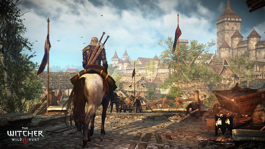The Witcher 3 Wild Hunt: Geralt Riding Through a Medieval Village HD wallpaper