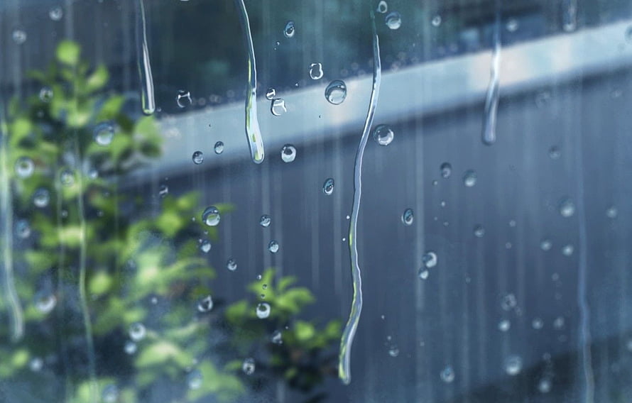 Raindrops on a Window Pane with Blurred Green Foliage and Blue Tint HD wallpaper