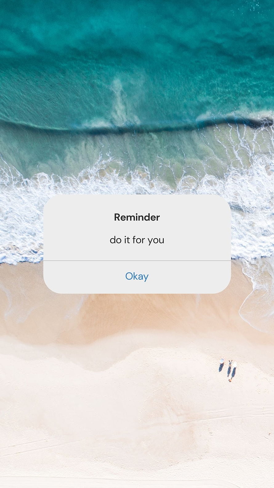Aerial Beach View with Motivational Reminder Overlay and Walking Figures HD phone wallpaper
