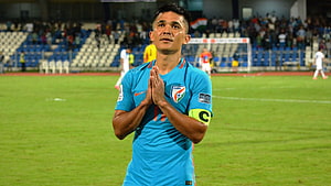 Sunil Chhetri in India national team jersey with captain armband on the football pitch HD wallpaper
