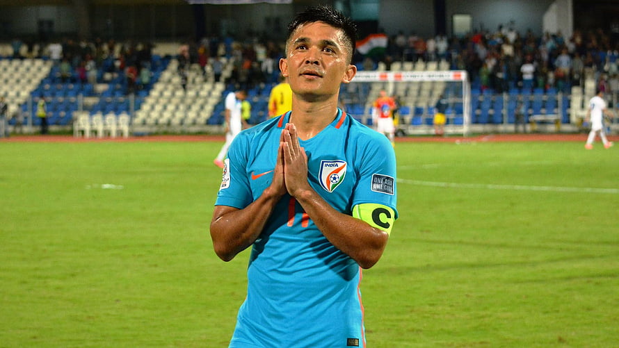 Sunil Chhetri in India national team jersey with captain armband on the football pitch HD wallpaper