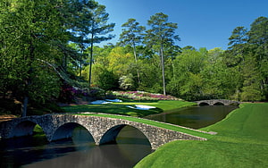 Augusta National Golf Club Stone Arch Bridge Over Water Hazard With Lush Green Fairway HD wallpaper