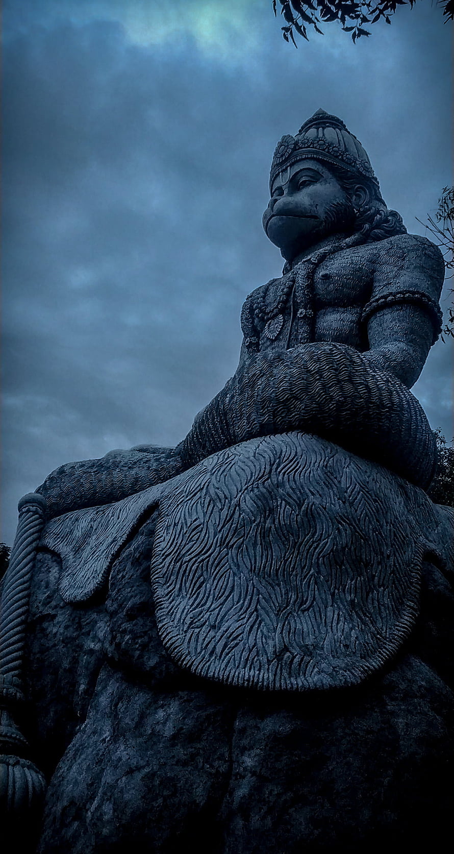 Anjaneya Hanuman Statue Under Dramatic Stormy Sky HD phone wallpaper