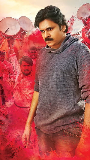 Pawan Kalyan Intense Action Portrait with Red Paint Splatter and Festival Drums HD phone wallpaper