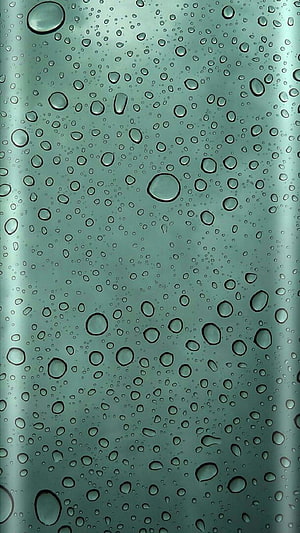 Raindrops on a Teal Glass Surface with Soft Diffused Light and Minimalist Texture HD phone wallpaper