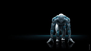 Crouching humanoid robot with glowing blue accents on a dark reflective surface HD wallpaper