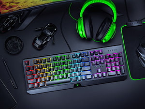 Razer RGB Gaming Keyboard and Headset Setup on Dark Desk HD wallpaper