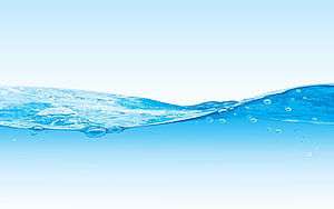 Crystal Clear Water Surface With Gentle Waves And Bubbles On A Soft Blue Gradient Background HD wallpaper