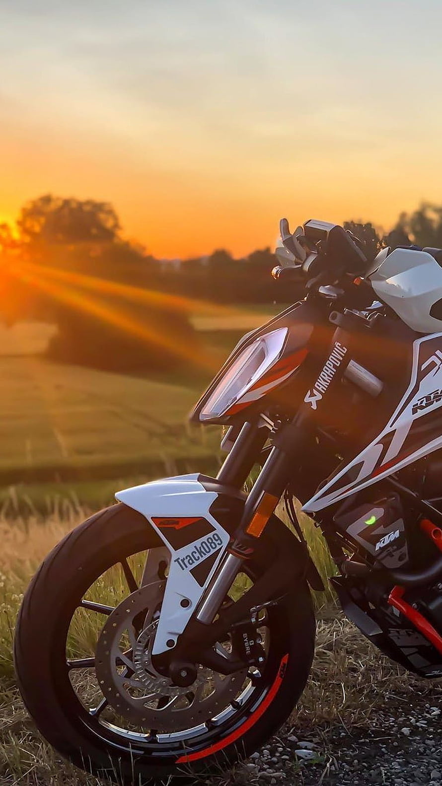KTM Duke 390 White and Orange Sport Motorcycle at Golden Sunset HD phone wallpaper