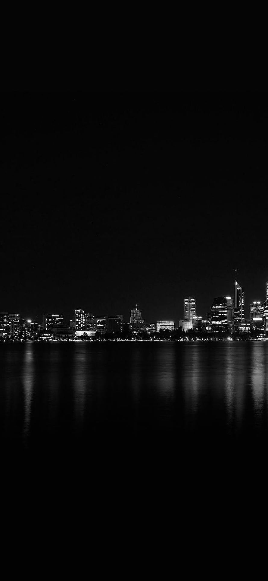 Monochrome City Skyline at Night with Water Reflections HD phone wallpaper