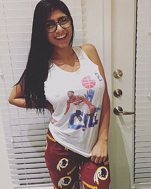 Mia Khalifa in White Tank Top and Washington Redskins Pajama Pants HD phone wallpaper