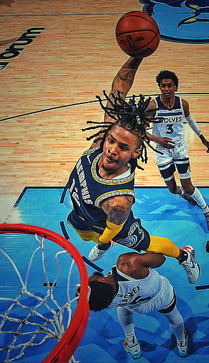 Ja Morant Soaring Over the Rim in a Powerful Memphis Grizzlies Dunk HD phone wallpaper