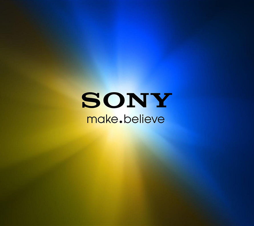 Sony Make Believe Logo on Blue and Yellow Radial Light Burst Background HD wallpaper