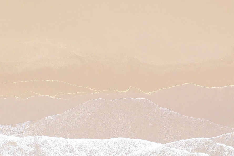 Minimalist beige mountain landscape with soft snow-capped peaks and hazy atmosphere HD wallpaper