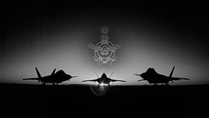Indian Air Force emblem displayed above three fighter jet silhouettes on a runway at dusk HD wallpaper