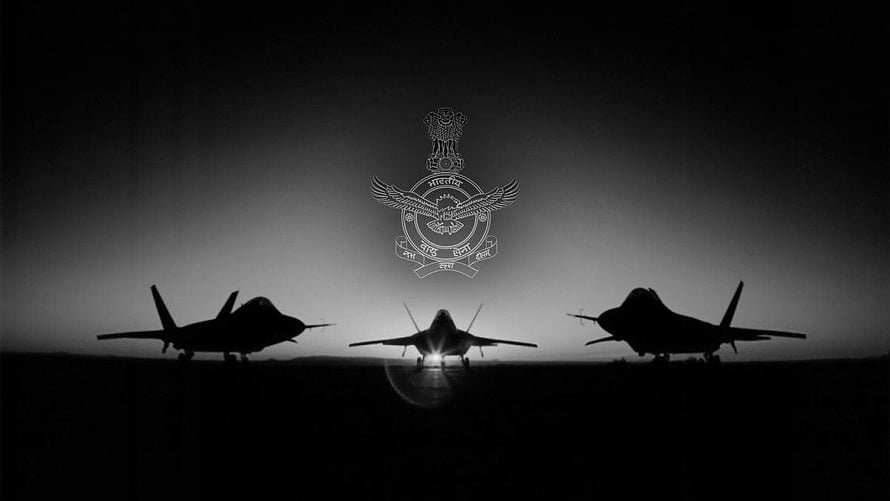 Indian Air Force emblem displayed above three fighter jet silhouettes on a runway at dusk HD wallpaper