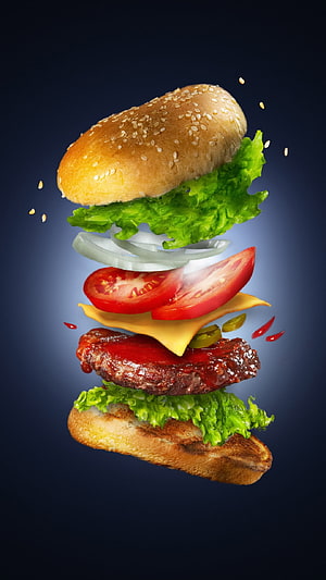 Exploded Cheeseburger with Sesame Bun, Lettuce, Tomato, Onion, and Pepperoni on Dark Background HD phone wallpaper