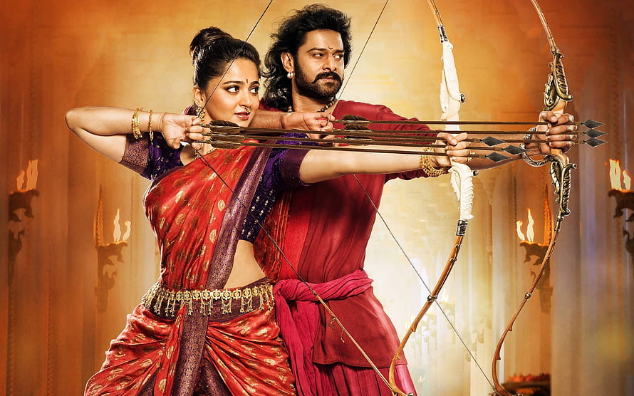 Baahubali 2 The Conclusion promotional still featuring Prabhas and Anushka Shetty in archery pose HD wallpaper