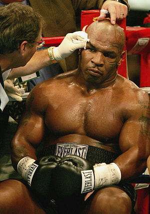 Mike Tyson in the Corner During a Boxing Match Wearing Everlast Gloves HD phone wallpaper