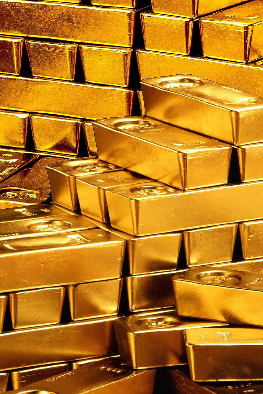 Stacked Gold Bullion Bars: A Close-Up of Precious Metal Wealth and Financial Security HD phone wallpaper