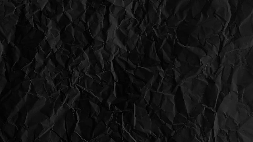 Dark Crumpled Paper Texture Background with Deep Folds and Rugged Surface Detail HD wallpaper