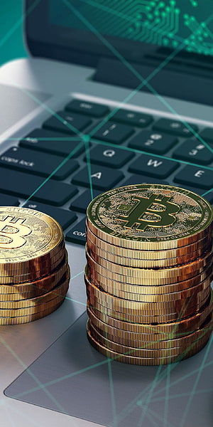 Stacks of Gold Bitcoin Coins on a Laptop Keyboard with Digital Network Overlay HD phone wallpaper