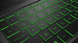 HP Omen Green Gaming Keyboard with Vibrant RGB Backlighting and Black Keycaps HD wallpaper