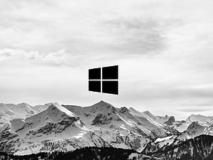 Monochrome Snow-Capped Mountain Range With Windows 10 Logo Overlay HD wallpaper