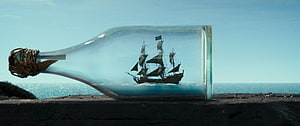 Pirates of the Caribbean Ship in a Bottle Cinematic Wallpaper HD wallpaper