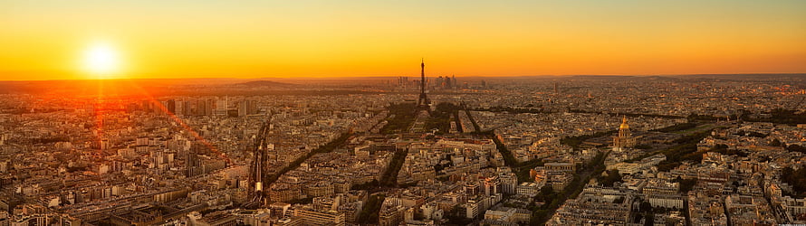 Aerial View of Paris at Golden Hour with Eiffel Tower and Cityscape HD wallpaper