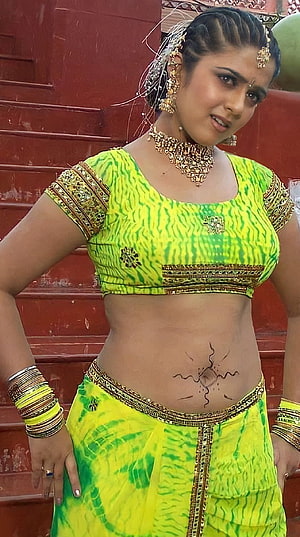 Charmi Kaur in Vibrant Green Bandhani Lehenga with Gold Jewelry and Navel Art HD phone wallpaper