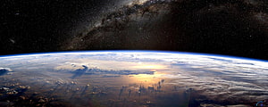 Earth Horizon at Sunset with Milky Way Galaxy in Deep Space HD wallpaper